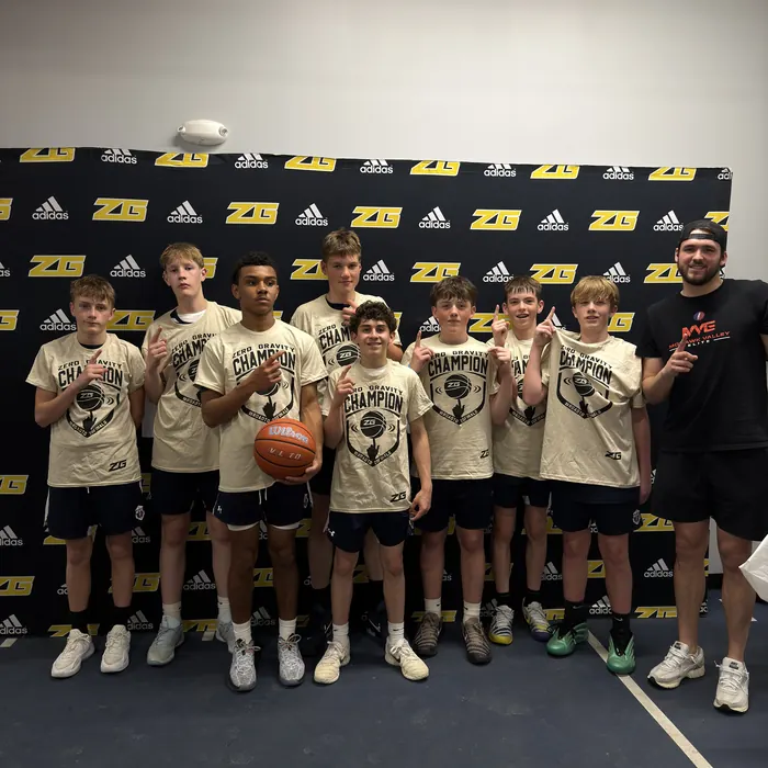 A younger MVE team in champion shirts after a Zero Gravity tournament win