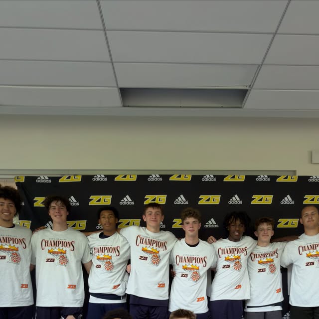 Another championship — MVE with their champions shirts