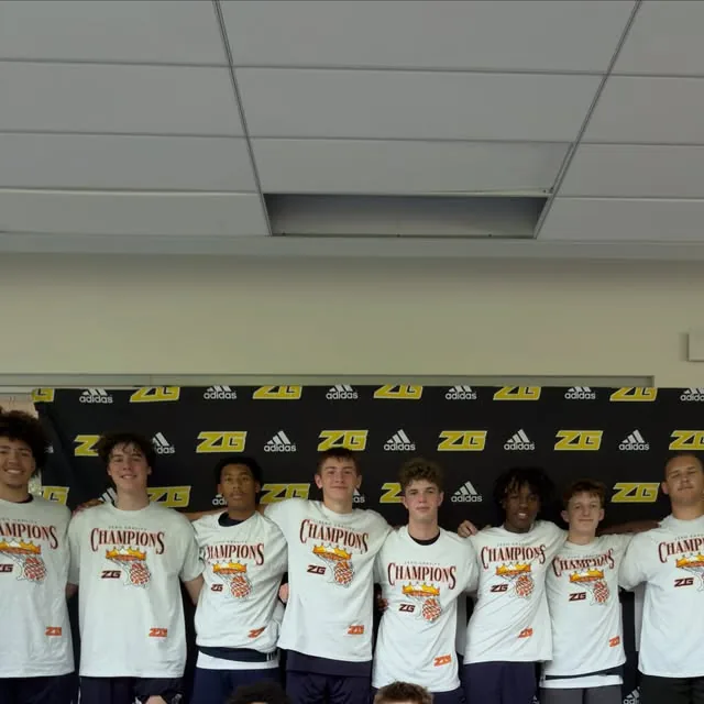 Another championship — MVE with their champions shirts