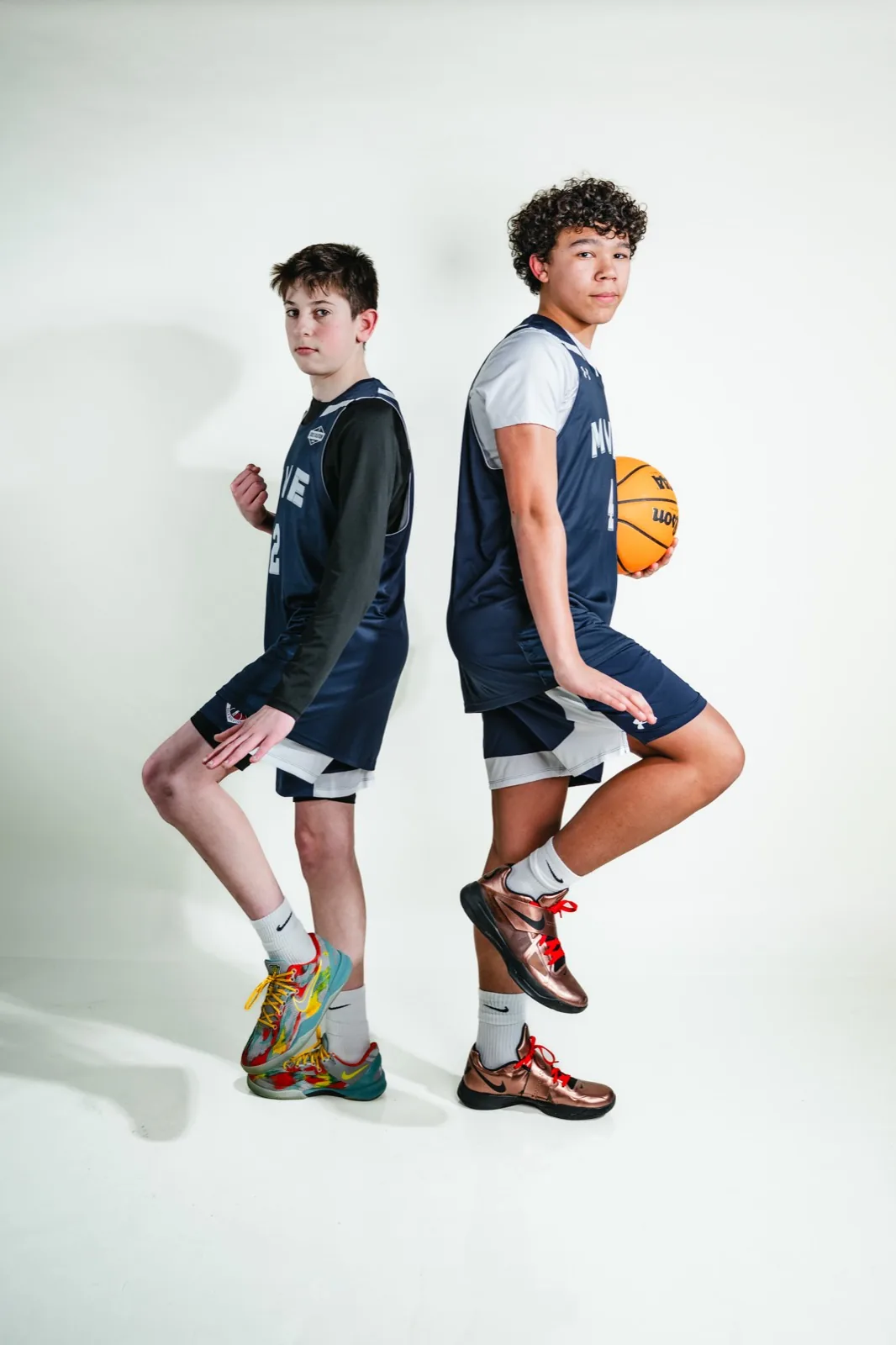 Two MVE players posing back to back at 2026 media day
