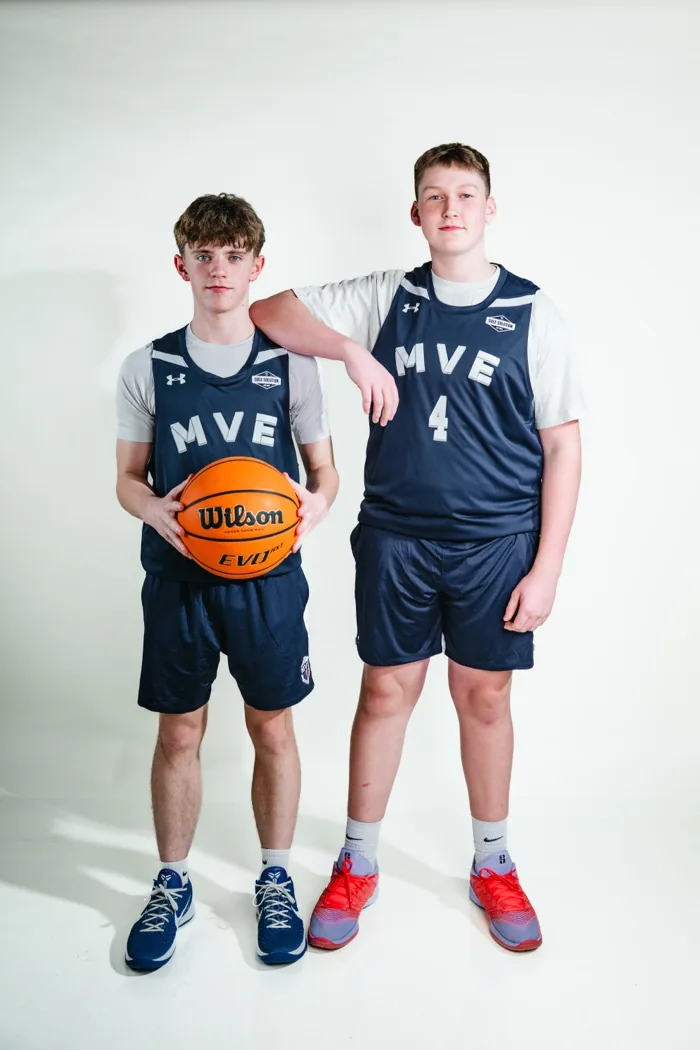 Two MVE teammates with a basketball at 2026 Media Day